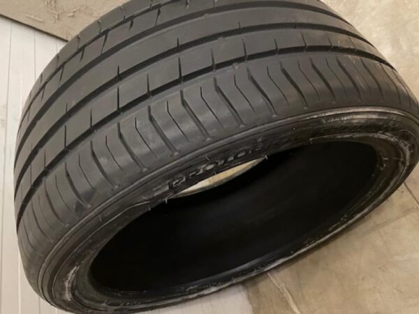265/35R20